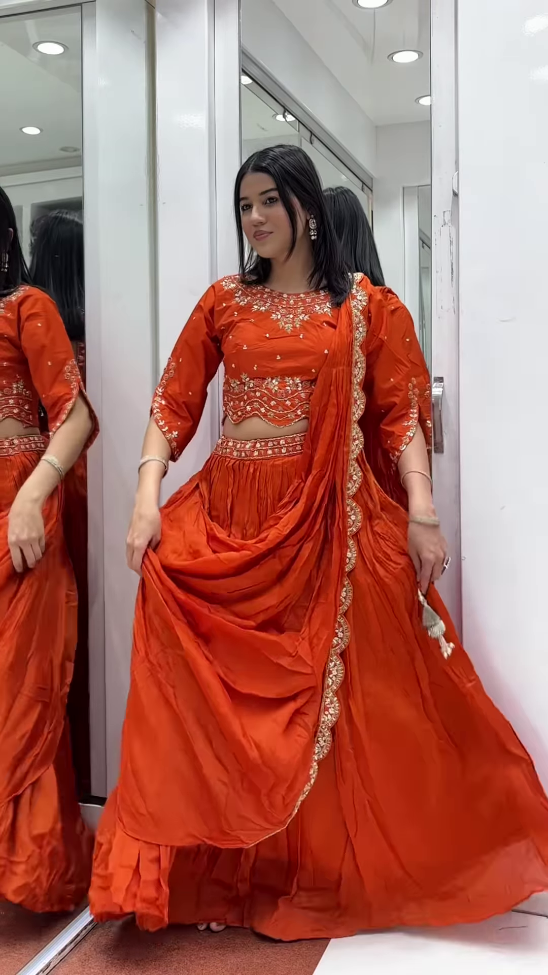 Vibrant Orange Draped Saree with Embellished Blouse