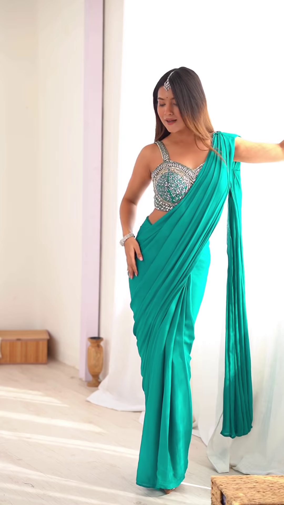 Teal Embellished Saree with Structured Blouse Detailing – A Modern Classic for Elegant Celebrations