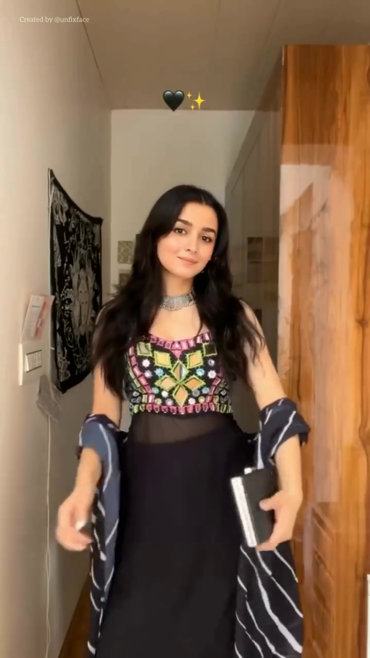 Multicolor Geometric Top with Black Skirt – Eclectic Glamour in Artistic Hallway