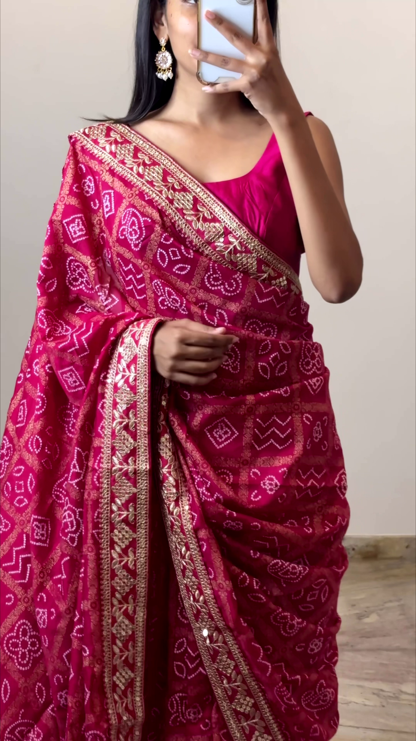Bright Pink Embroidered Saree – Festive Radiance in a Mirror Moment