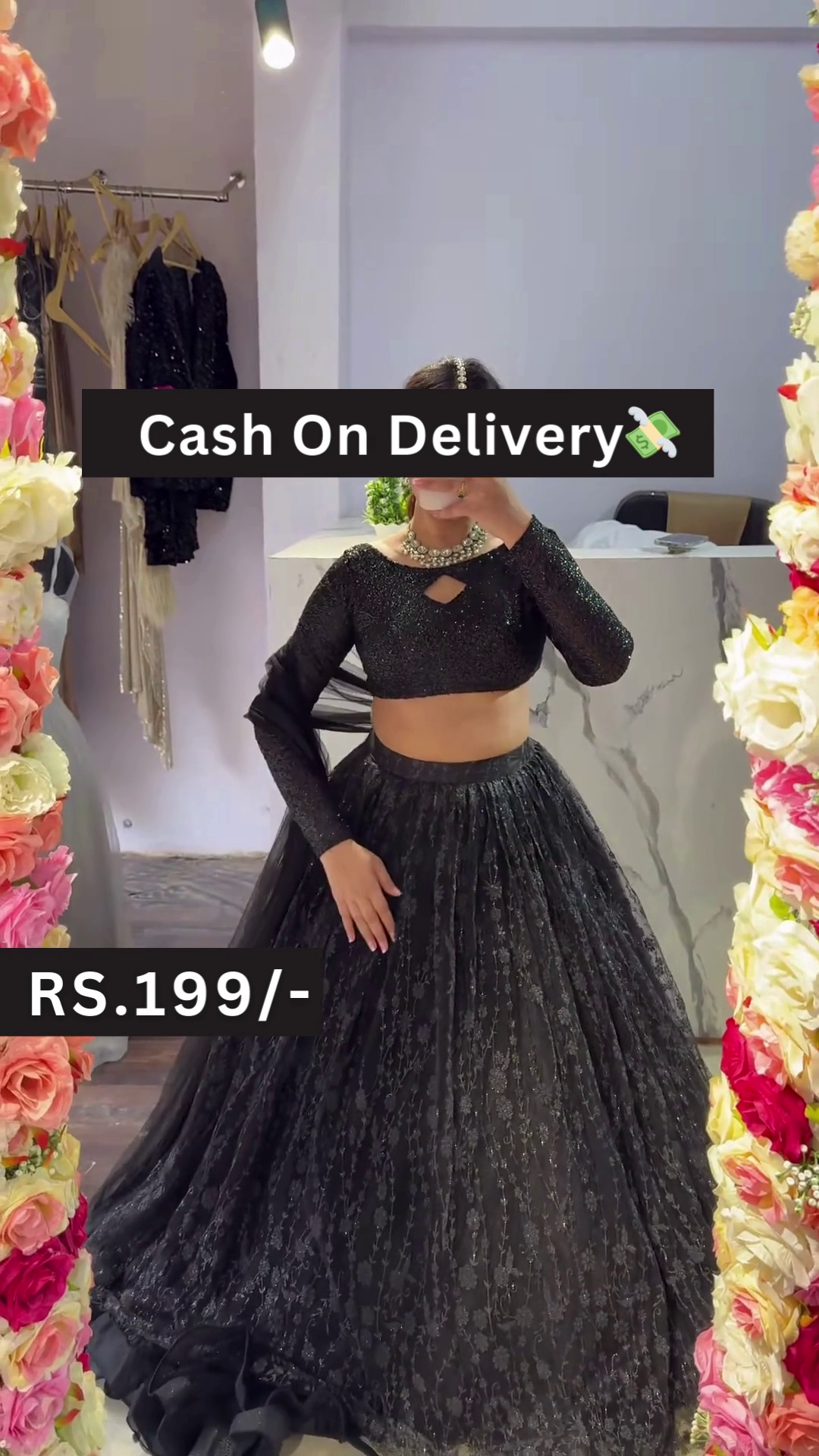 Black Sequin Crop Top Lehenga Set with Lace Skirt and Floral Mirror Selfie Styling ā Glam Fusion for Every Festive Mood