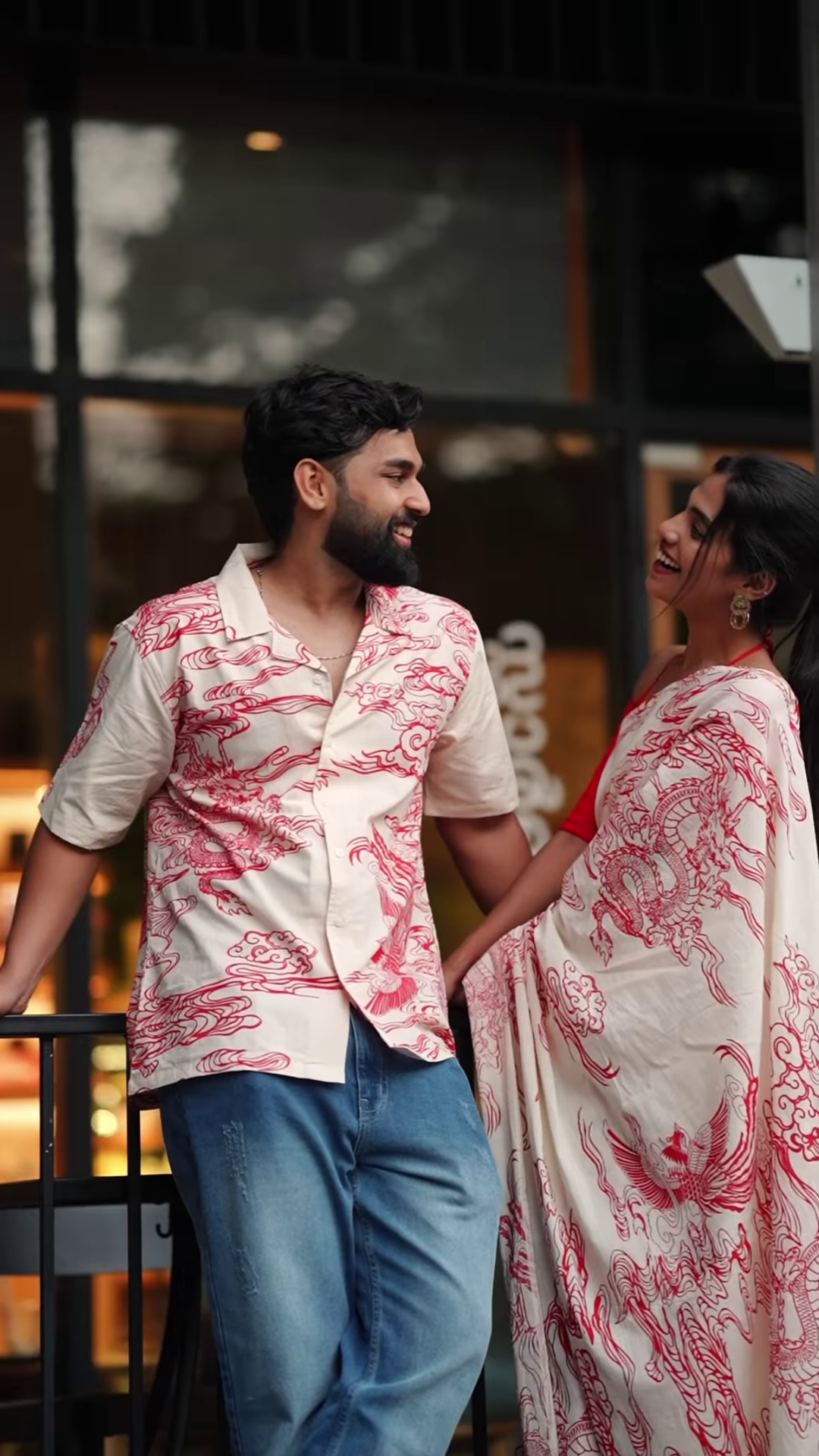 Couple’s Coordinated Ethnic Ensemble – White & Red Printed Saree with Matching Shirt and Jeans
