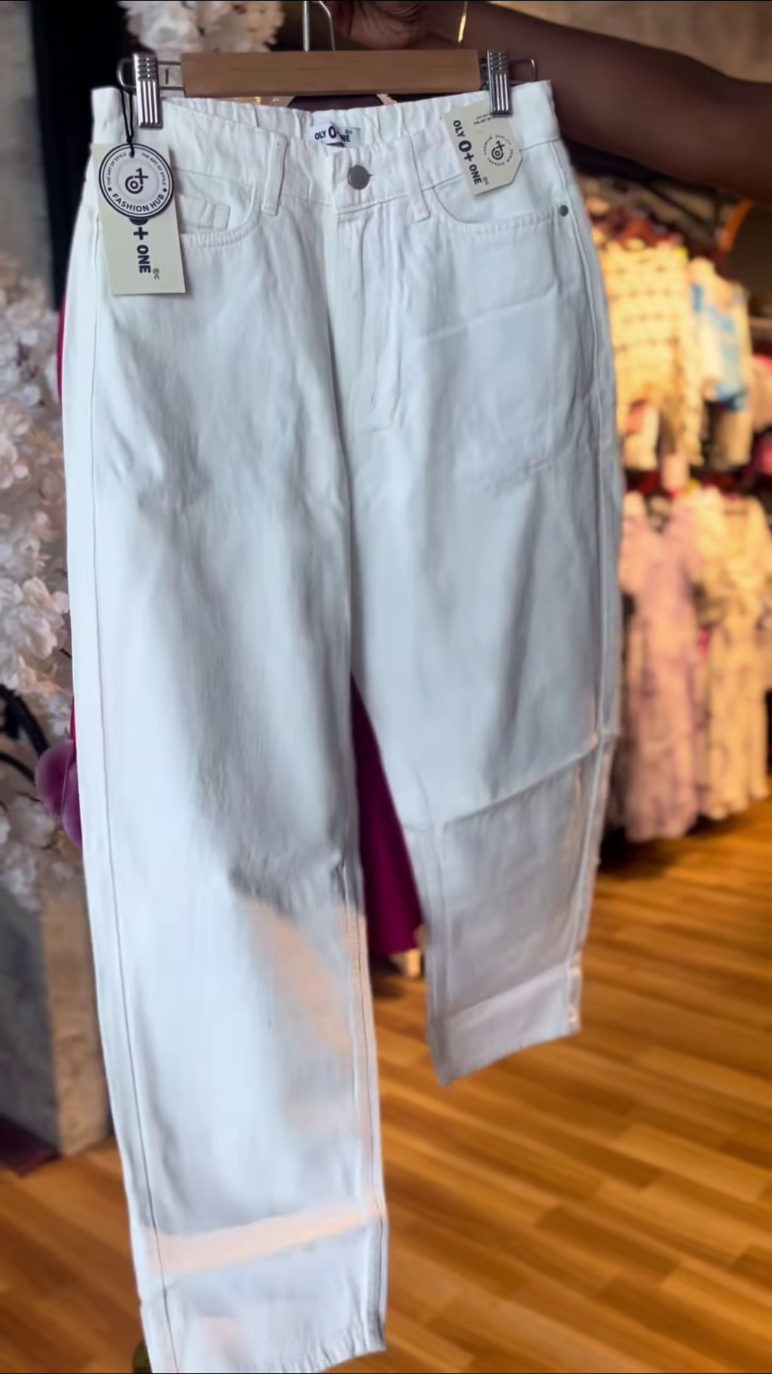 Women’s Textured Red Long-Sleeve Top with V-Neck Collar & Pleated Sleeve Detail – Paired with White Slim Pants