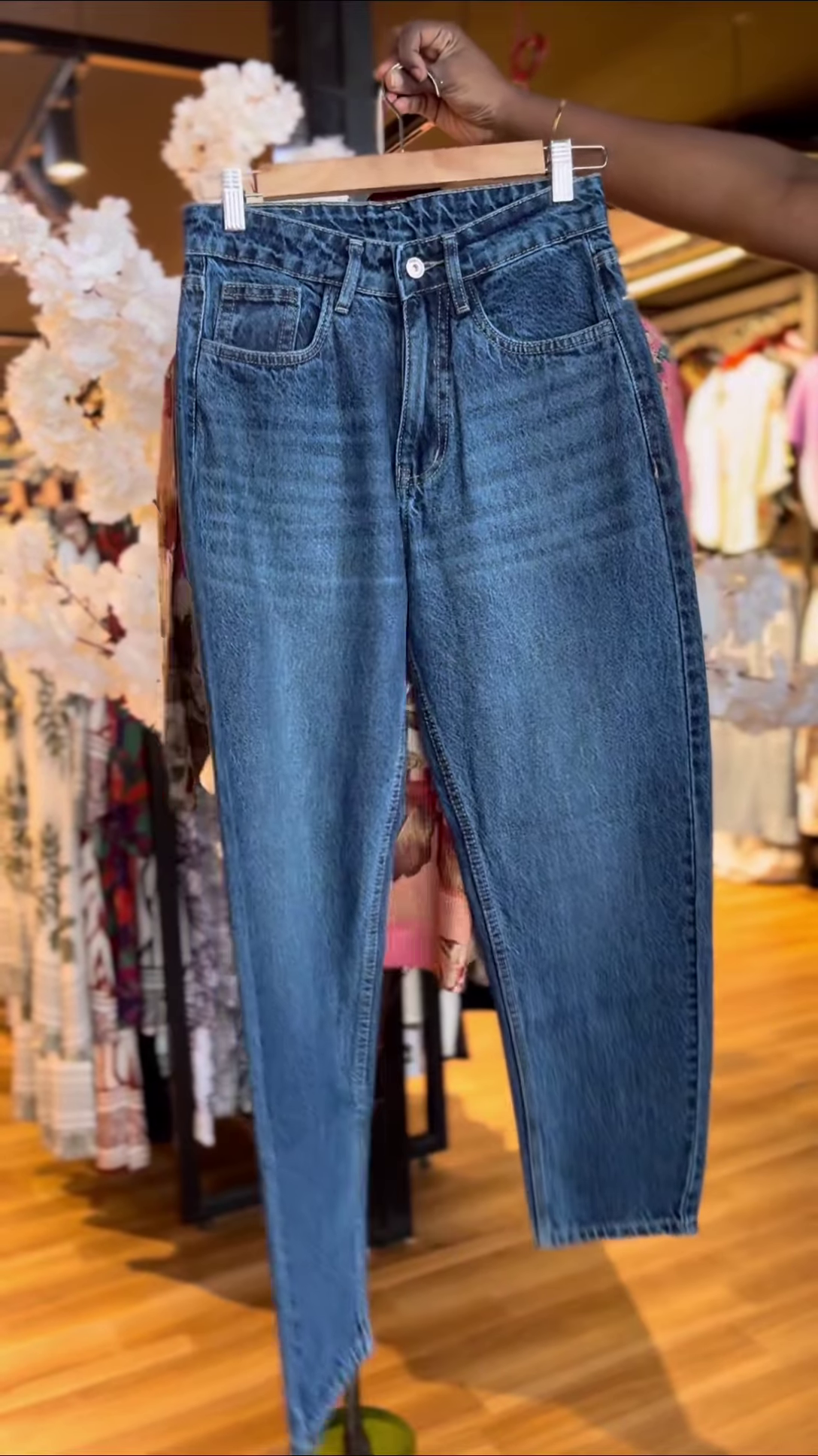 Women’s Patchwork Floral Print Sweater with Blue High-Waisted Jeans – Casual Boutique-Inspired Ensemble