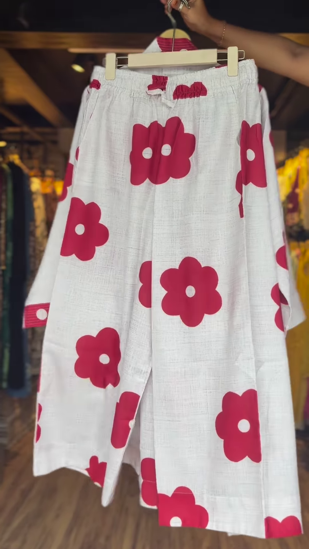 Women’s White Asymmetrical Top with Bold Red Floral Prints – Elegant High-Low Casualwear