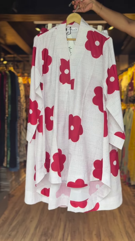 Women’s White Asymmetrical Top with Bold Red Floral Prints – Elegant High-Low Casualwear