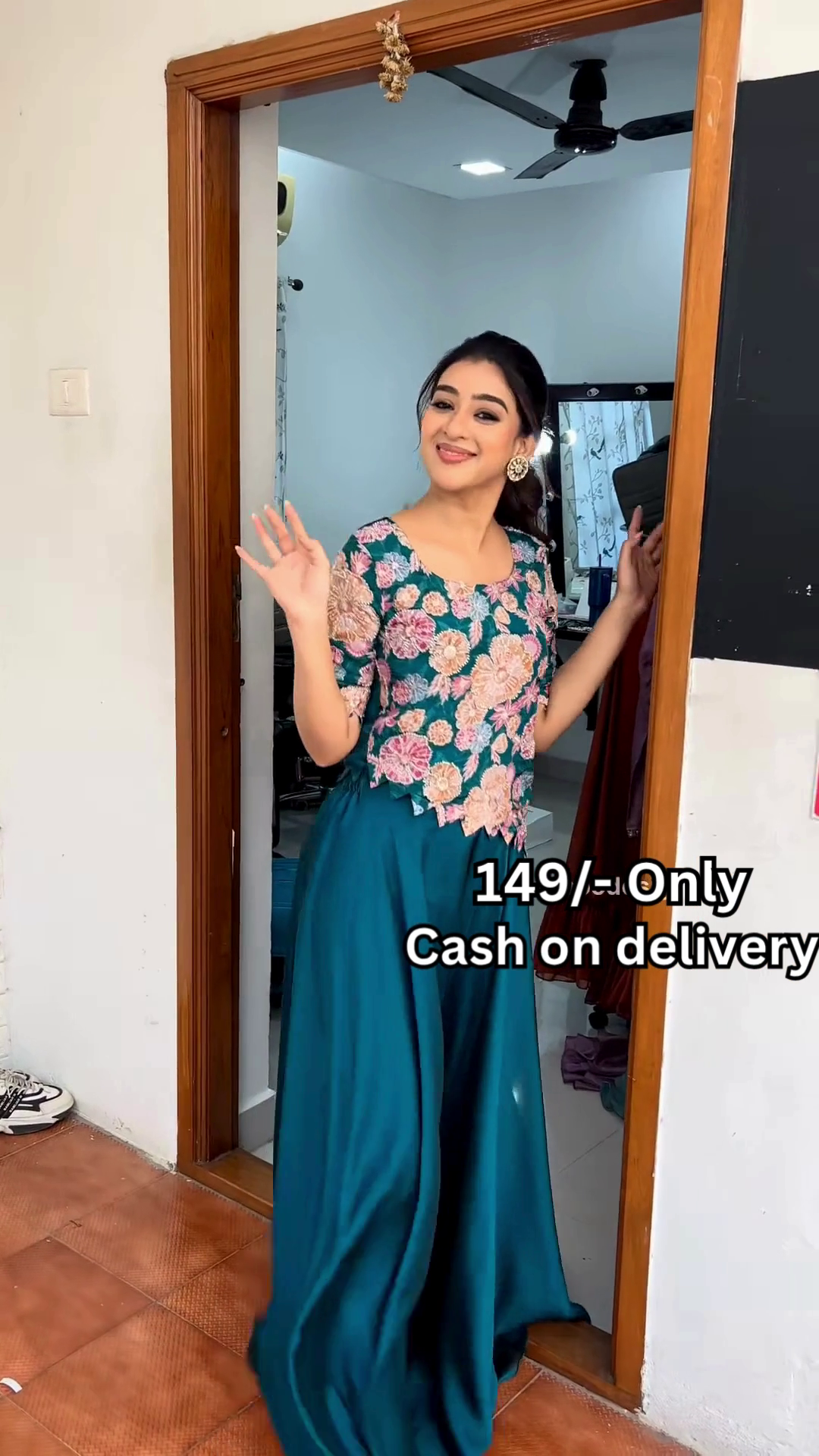 Women’s Red Embroidered Skirt Top Set with Traditional Earrings – Ethnic Doorway Portrait Ensemble