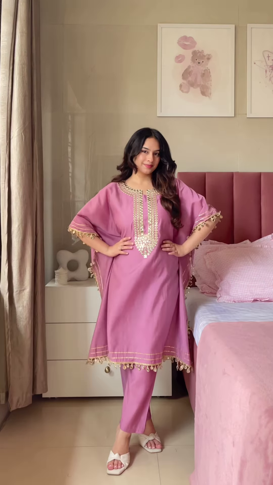 Women’s Cream Embroidered Long Kurti with Multicolor Circular Motifs and Tassel Accents – Heritage-Inspired Ethnicwear Portrait