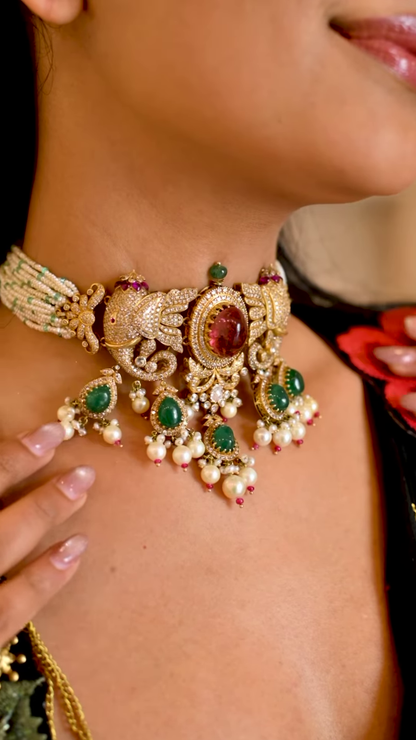 Women’s Black Saree with Gold Embellishments & Pleated Draping – Elegant Ethnicwear Styled with Traditional Bracelet