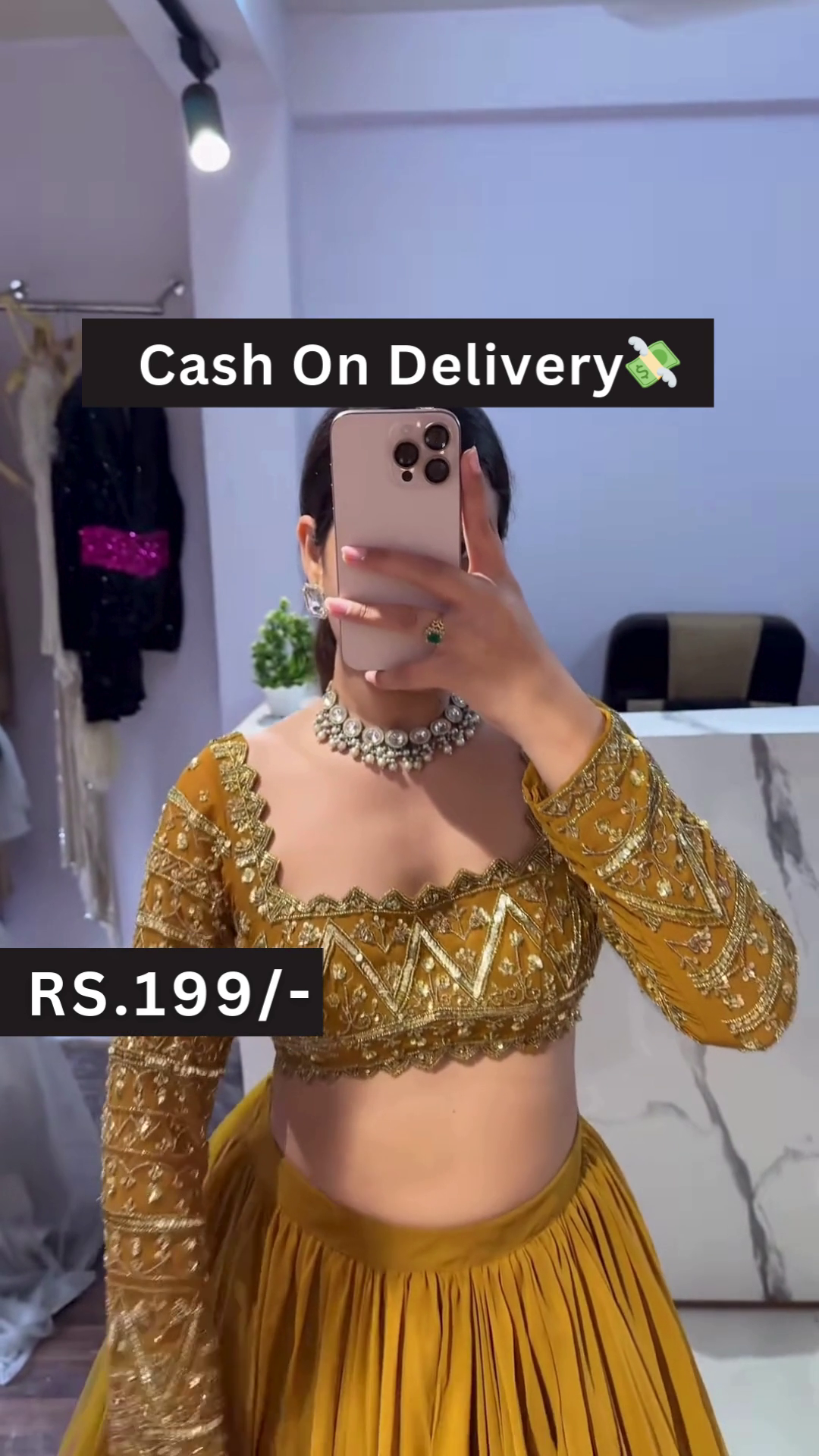 Golden Embroidered Blouse with Mustard Pleated Lehenga – Breezy Festive Style with Floral Mirror Selfie Vibes