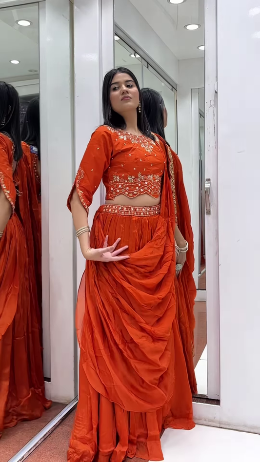 Vibrant Orange Draped Saree with Embellished Blouse