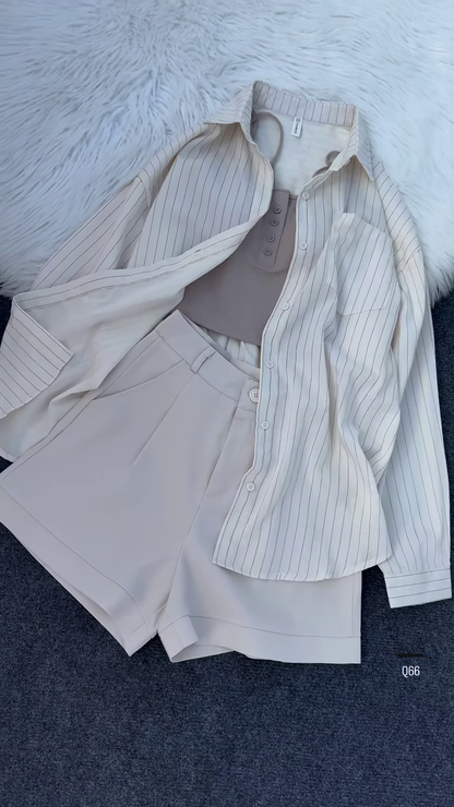 Stylish White Top with Floral Embroidery and Blue Jeans