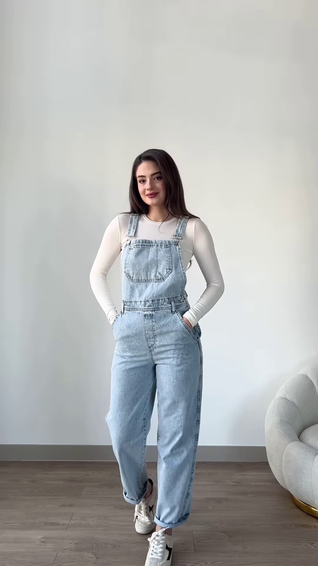 Stylish Denim Overalls with Long-Sleeved Top and Sneakers