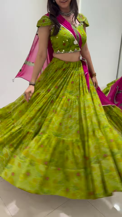 Graceful Green Lehenga Choli with Ornate Pink Dupatta – A Celebration of Elegance and Heritage