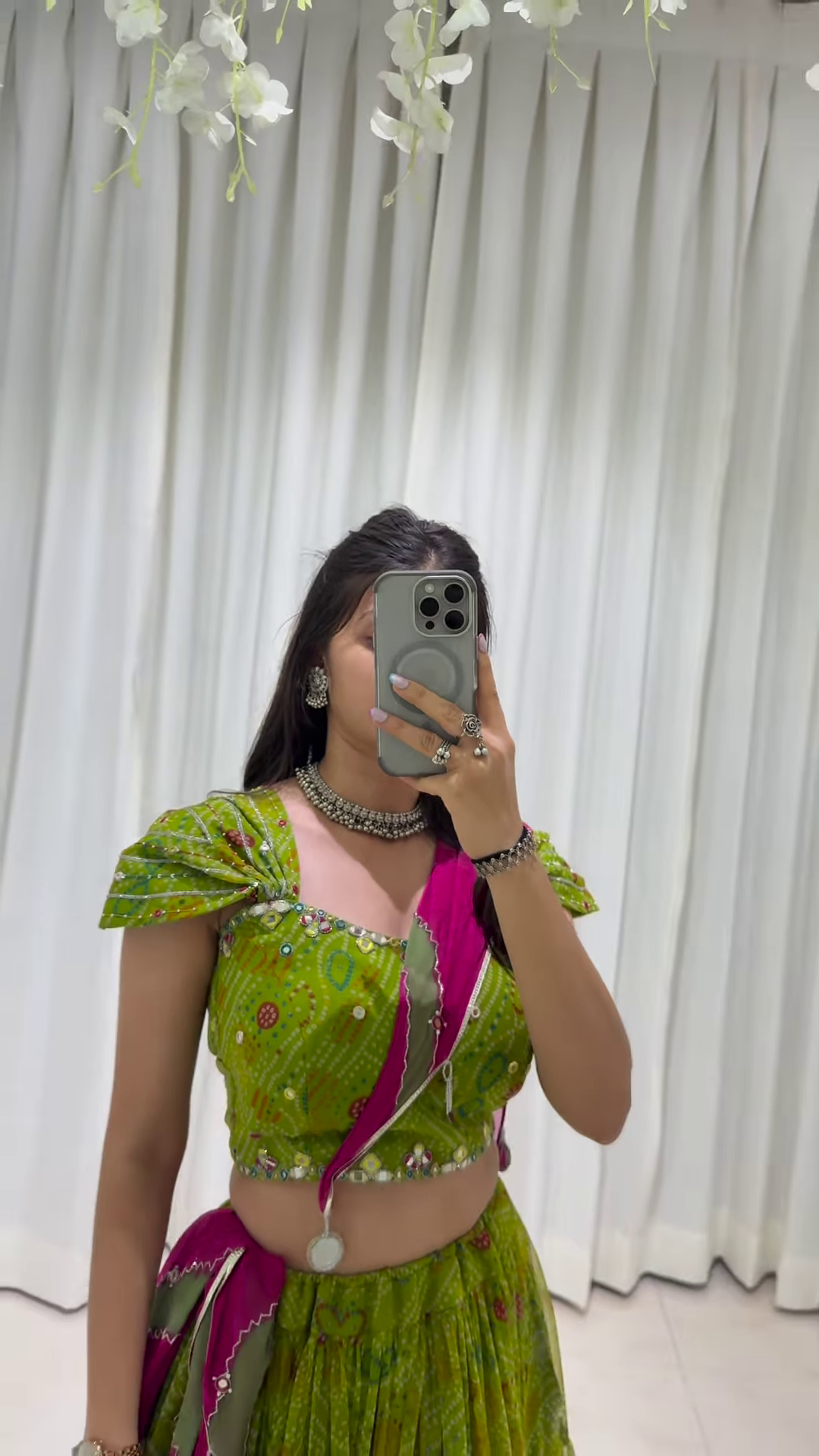 Graceful Green Lehenga Choli with Ornate Pink Dupatta – A Celebration of Elegance and Heritage