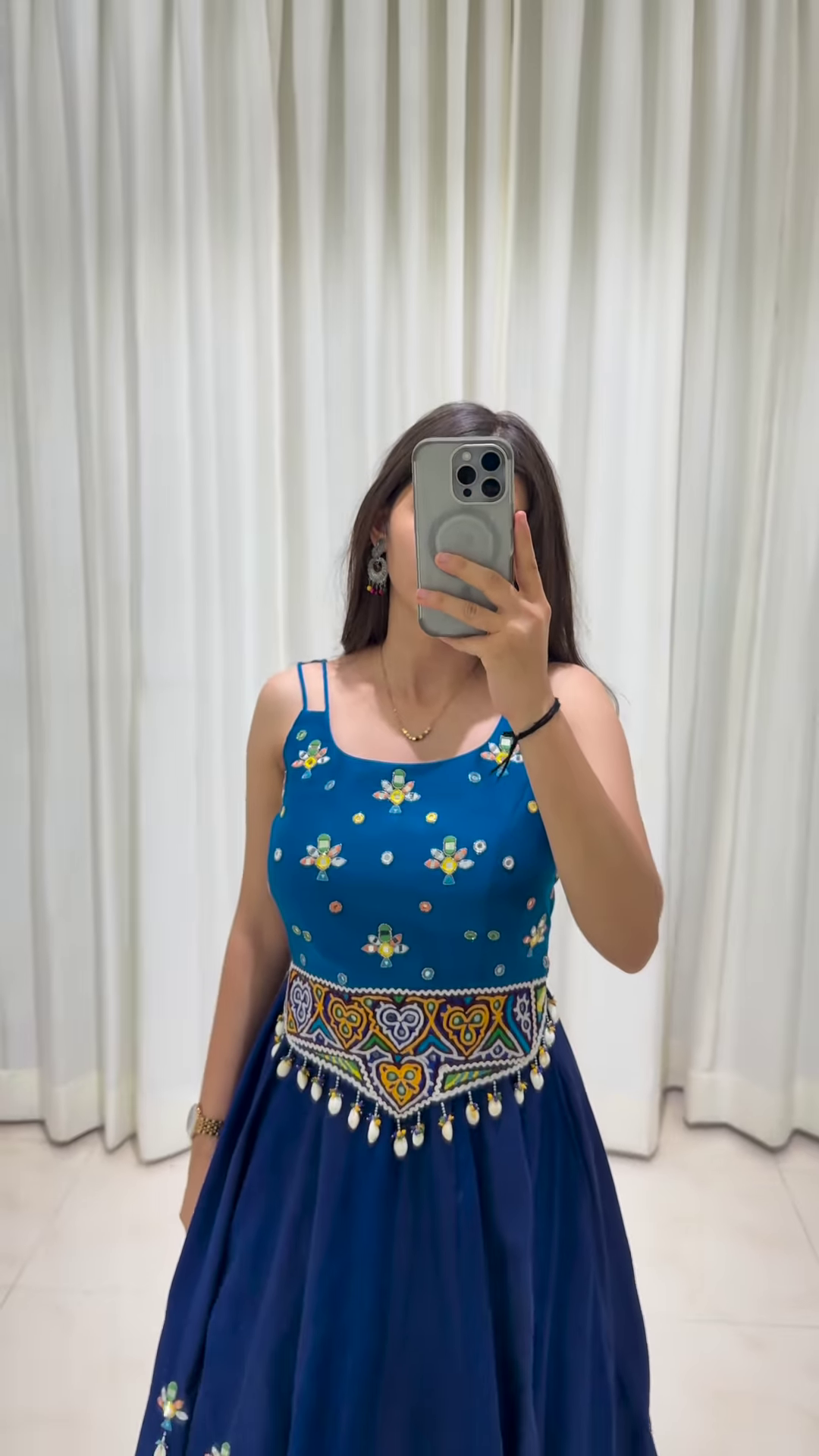 Blue Floral Embroidered Lehenga Choli with Beaded Belt and Sleek Sleeveless Silhouette – A Modern Twist on Regal Ethnicity