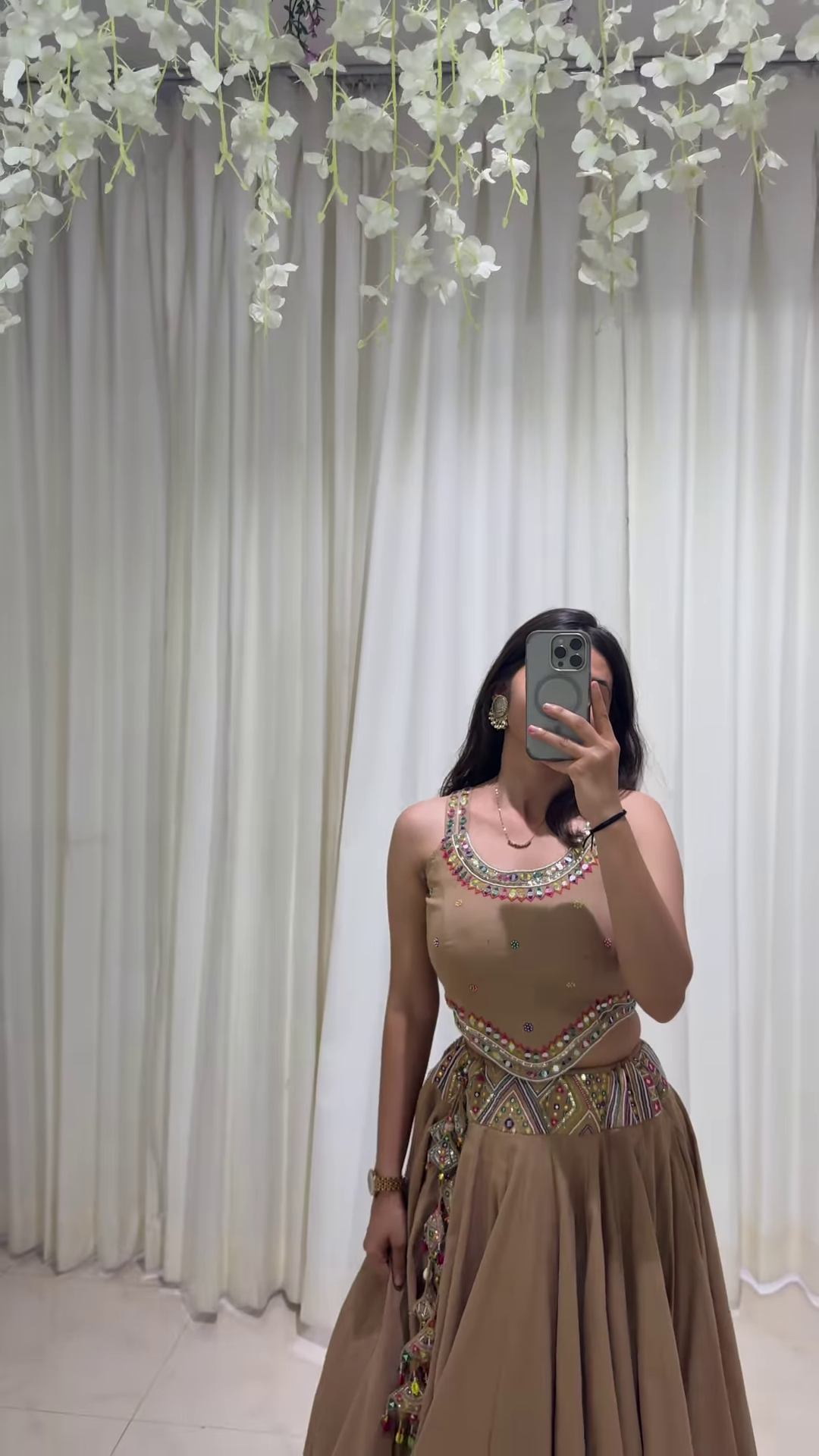 Brown Embroidered Lehenga Choli with Ornamental Tassel Detailing – A Classically Styled Look for Festive Grandeur