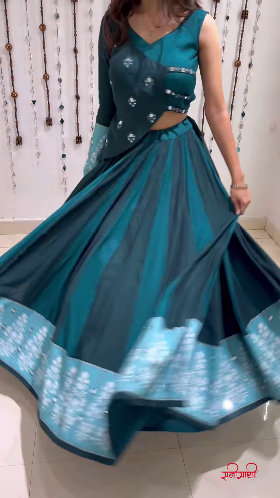 Teal Twirl Lehenga Choli with Floral Cutwork and Embroidered Border – Designed for Dynamic Festive Elegance and Cultural Charm