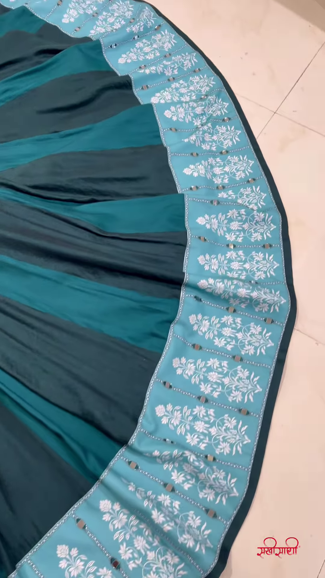 Teal Twirl Lehenga Choli with Floral Cutwork and Embroidered Border – Designed for Dynamic Festive Elegance and Cultural Charm
