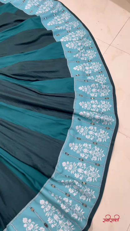 Teal Twirl Lehenga Choli with Floral Cutwork and Embroidered Border – Designed for Dynamic Festive Elegance and Cultural Charm