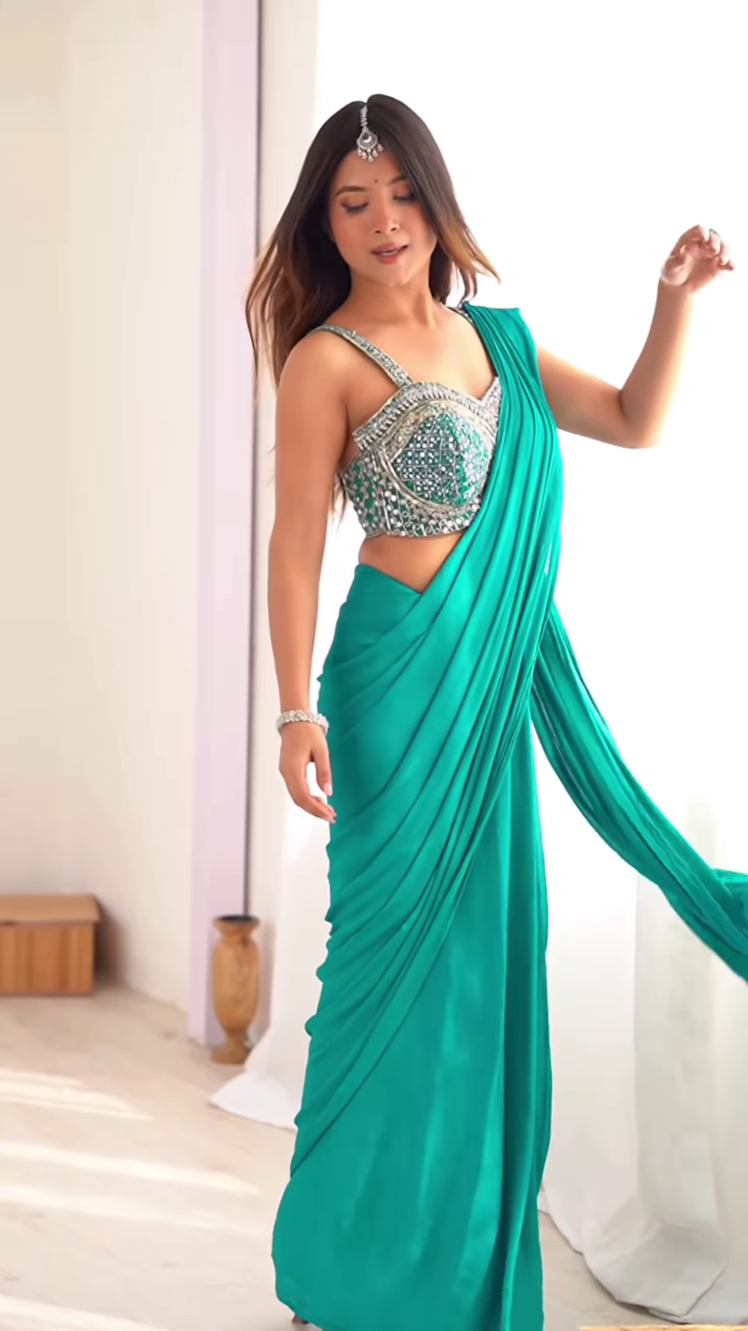 Teal Embellished Saree with Structured Blouse Detailing – A Modern Classic for Elegant Celebrations