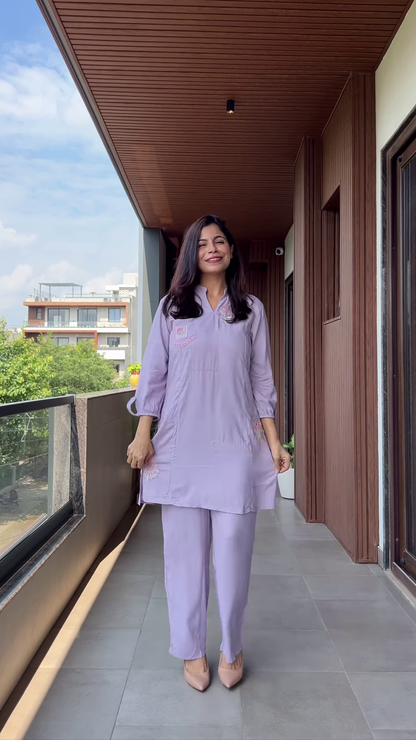 Lavender Embroidered Kurta Set with Balcony Backdrop – Soft Sophistication in Urban Serenity