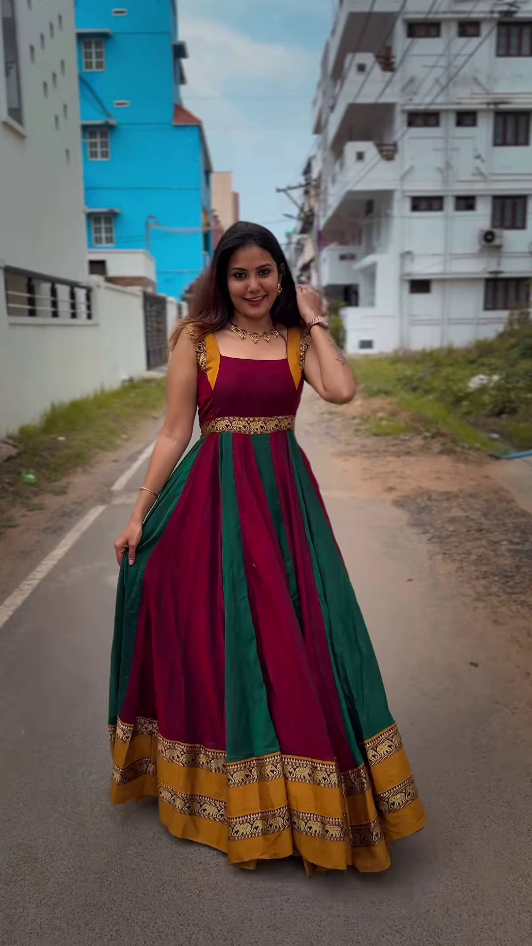 Regal Green & Maroon Anarkali Suit with Gold Zari Embellishments