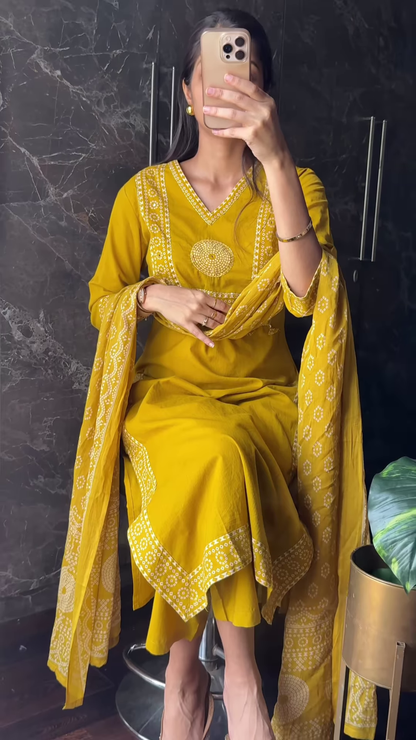 Mustard Embroidered Kurta Set in Marble Interior – Regal Warmth Meets Contemporary Chic