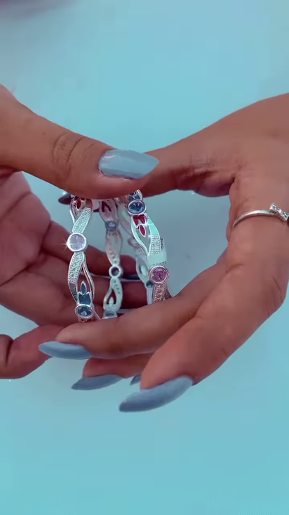 Elegant Silver-Toned Bangle Set with Intricate Filigree and Gemstone Accents