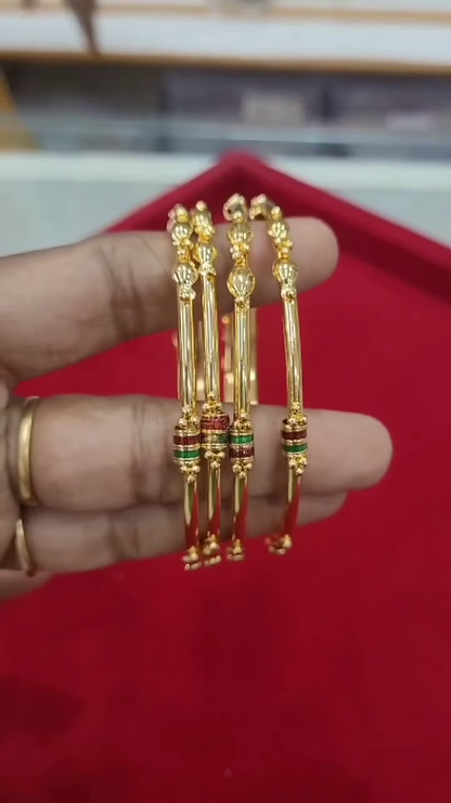 Set of Four Traditional Gold-Plated Bangles with Enamel and Bead Accents