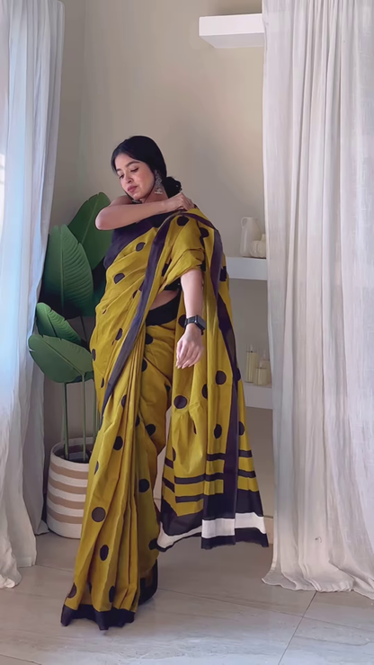 Yellow Polka Dot Saree in Sunlit Interior – Retro Charm with Contemporary Poise