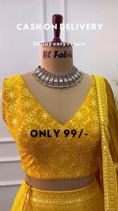 Yellow Colored Party wear Embroidered Lehenga Choli